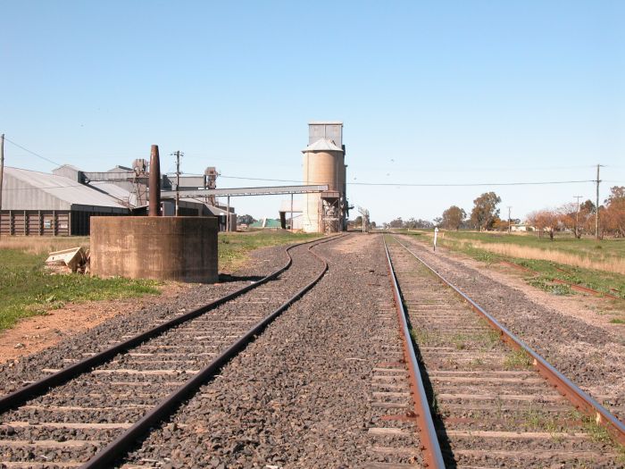 
The base of a jib crane and silos mark the location.  The one-time platform
was on the right hand side of the main line.
