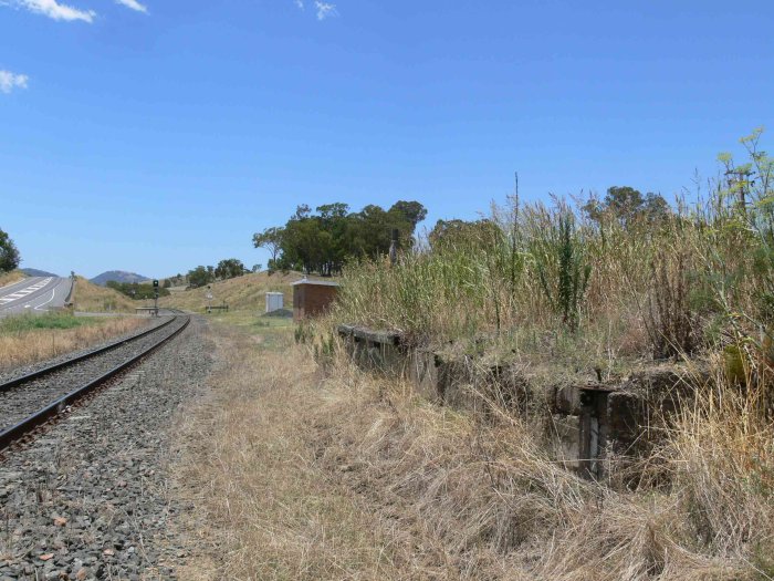 The view looking back up the line towards Werris Creek. The former station was located where the brick building now resides.