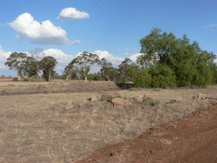 The view looking east towards the former station location. The debris in the foreground is likely the remains of the station foundations.