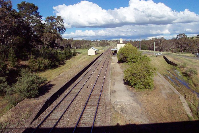 
A view showing the up platform, looking towards Sydney.  The loop sidings on
the outside of the platforms are now lifted.  The structure on the right
was the dock platform.
