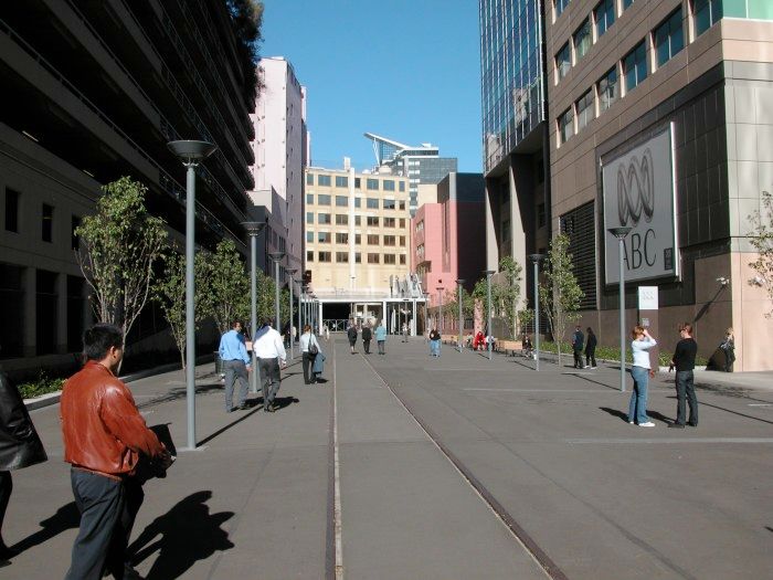 
The new combined public walkway and operating railway siding running
from Central Station yard to the Powerhouse Museum. The line passes
through a tunnel seen in the background to join the main line at
Central.
