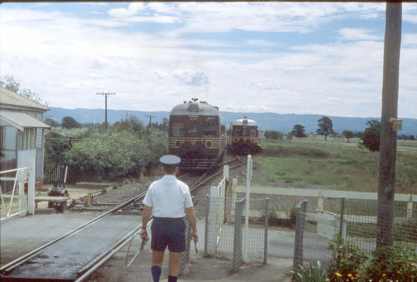 The passing of two DMU sets required the up to pull into the station then reverse into the siding to let the down proceed.
