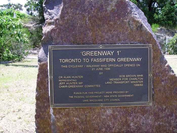 A plaque commemorating the opening of the former branch line to Toronto as a cycleway.
