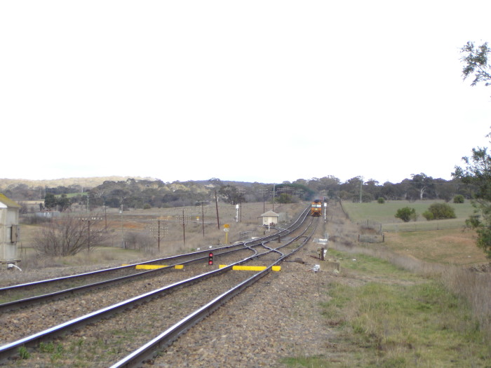 The view looking down the line towards the junction. The yellow objects are dragging equipment detectors.