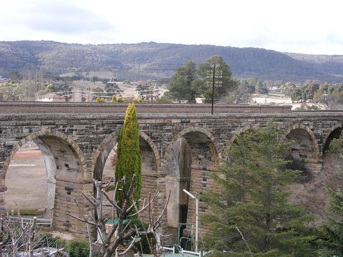 
The original stone viaduct with the modern replacement just visible behind it.
