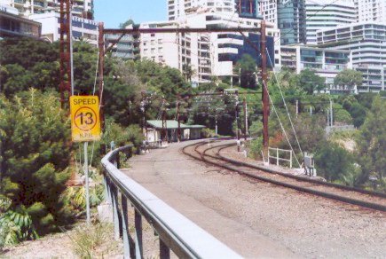 The view looking towards an empty North Sydney car siding. Photograph taken from the access walkway for the railway workers from Clark Park, North Sydney looking towards Milson Point.