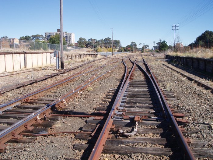 The view looking towards Canberra. On the left is the loading bank and goods platforms, with the stock platform on the right. The goods platform once had a goods shed on it.