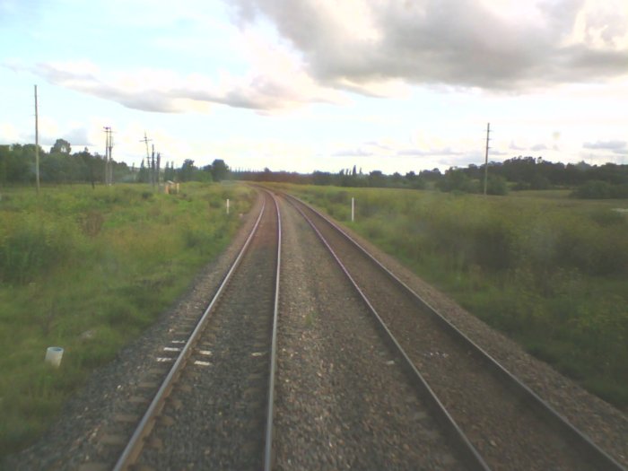 The location of the former island platform, looking in the up direction just past the Hebden Road level crossing.
