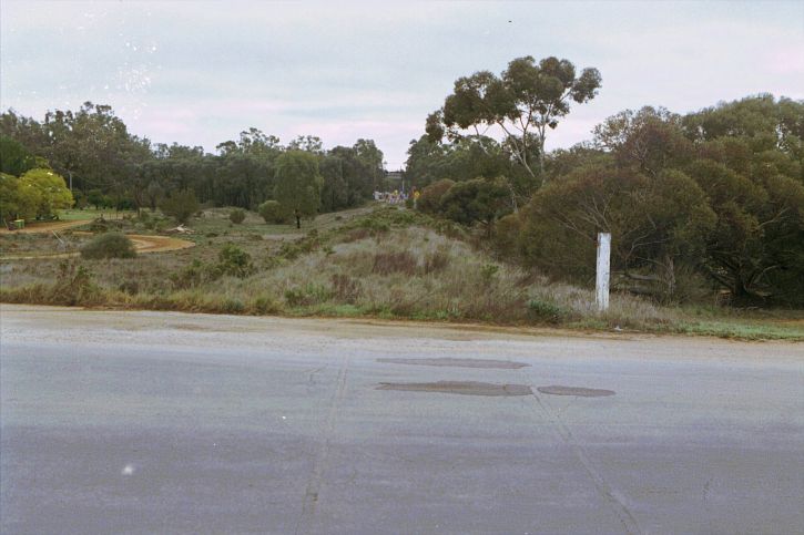 
The remains of the tracks to the north of the yard.  In the distance is
the bridge over the Murray River, which was shared by trains and cars.
