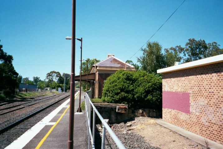 
The view north along the platform, showing the station building.
