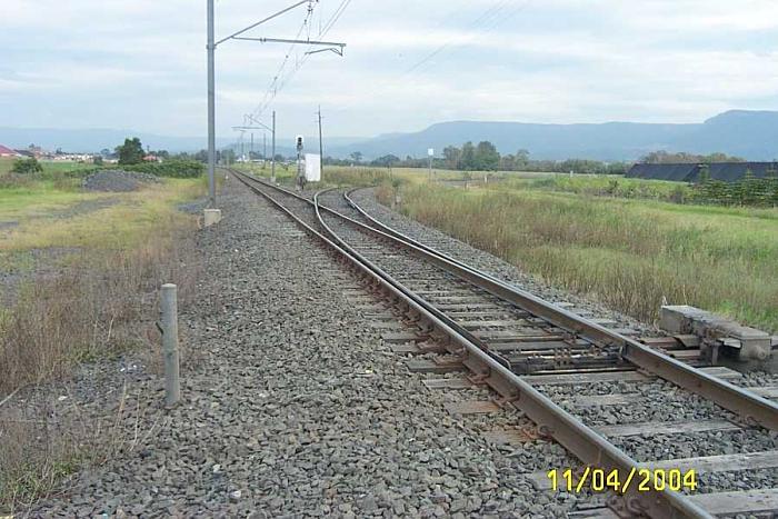 
A view of the junction looking south.  The line to the right curves and climbs
up to the coal loader at Wongawilli.
