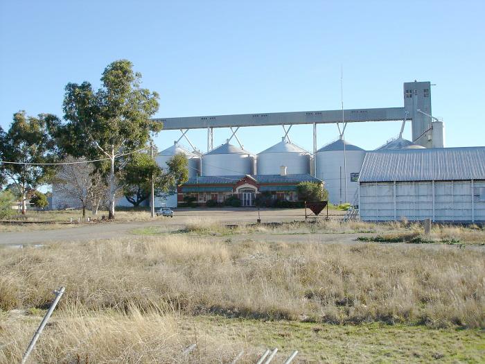 The now-closed station is dominated by the adjacent silos.