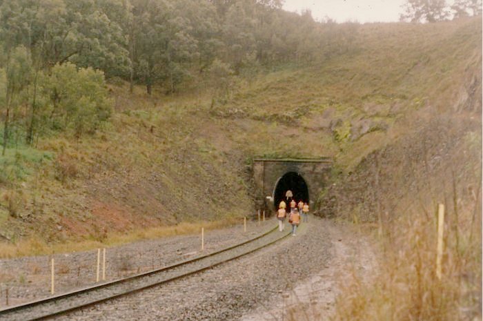 General view of the Up end of the Ardglen tunnel. The people are inspecting the tunnel in the tendering process to supply radiating cable through the tunnel for the Countrynet radio.