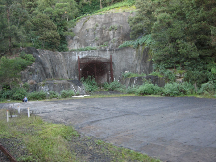 The southern portal of the unfinished Avon tunnel on the never completed Dombarton - Maldon line. The tunnel only extends a few metres into the rock.