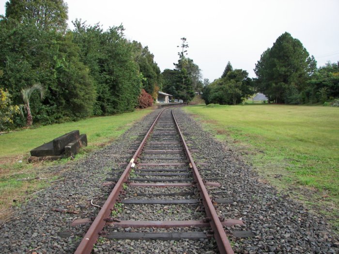 The view looking east towards the station. On the left was a sawmill siding. In the right were loop and goods sidings, the latter featuring pig and cattle races, a gantry crane and goods shed.