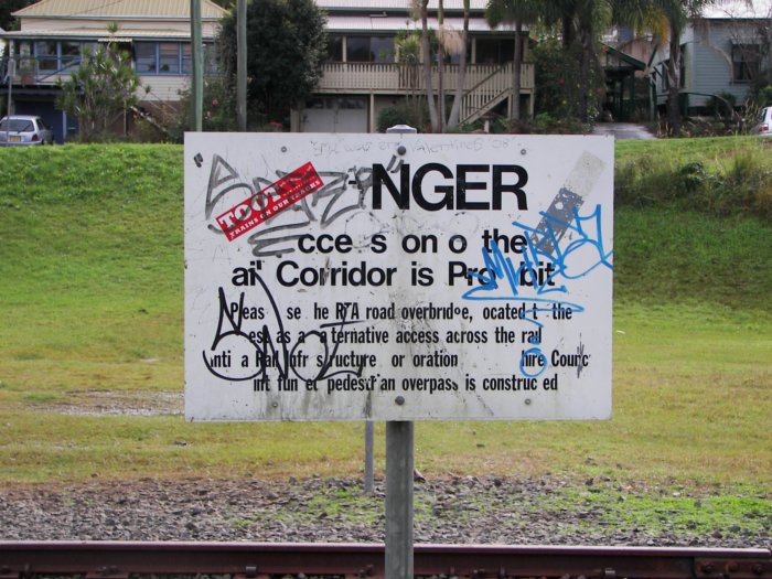 A sign 100 metres from Byron Bay end of platform. Trains no longer traverse this corridor.