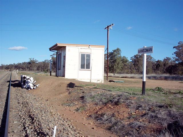 
The remains of the station, looking towards Temora.  Only the nameboard and
staff hut remain.
