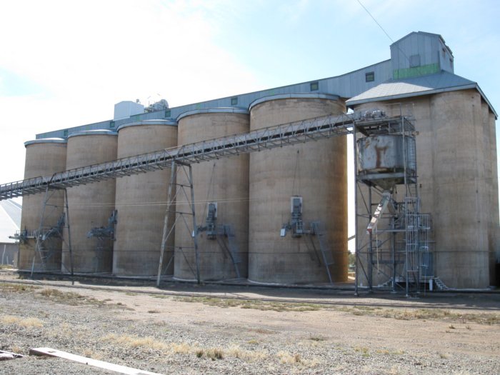 The large silo complex opposite the station.