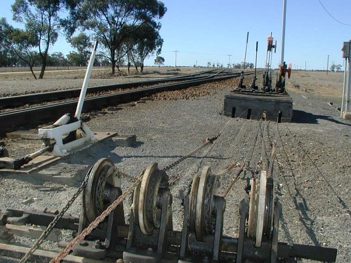 
The lever frame and pulleys which control the signal and points at the
junction of the Balranald line, which branches off to the left.
