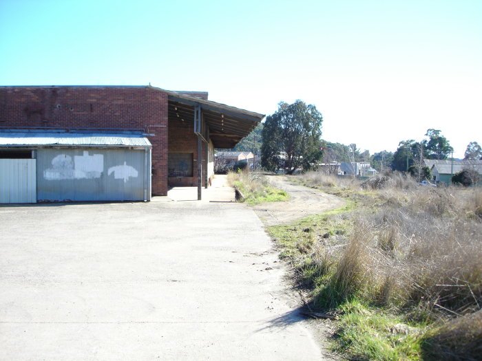 A closer view of the Cold Store, with the rails still visible in the dirt.