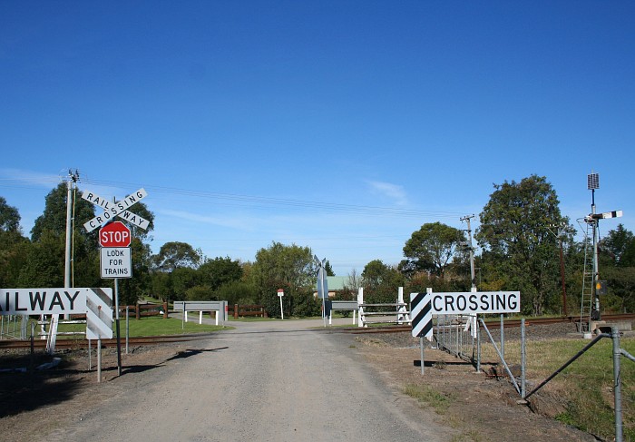 The uncontrolled level crossing south of the station, Nowra is to the right.