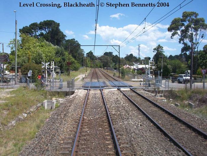 
The crossing arms are lowered as an up train approaches the crossing near
Blackheath station.
