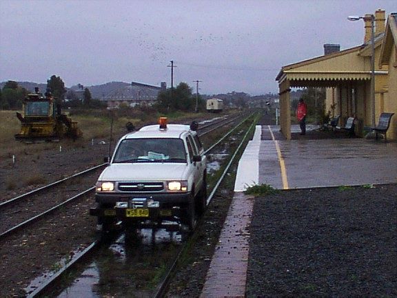 
Trackwork is being performed in the area, as indicated by the hi-railer
heading down the platform road.
