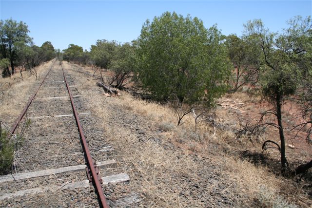 The view looking towards Bourke with the water tank remains on the right of the track.