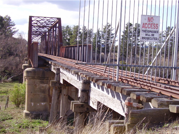 - A view of the barricade at the southern end of the Wollondilly River bridge on the Crookwell branch line at Goulburn.  There is a similar barricade at the northern end.