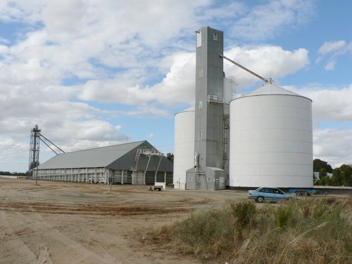 The view looking north towards the silos.  The main line is behind the structures.