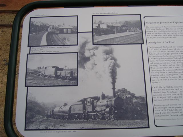 Photographs on an information board located in the yard.