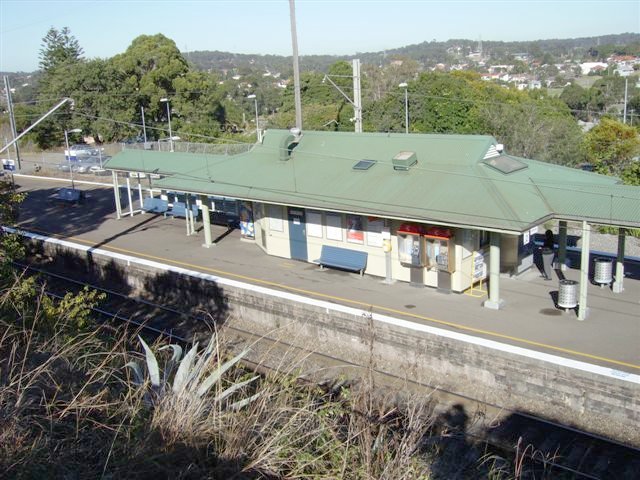 Cardiff Station's island platform and station building as viewed from the Main Road , Cardiff. The track closest to the camera is the down line for services running from Sydney to Newcastle and the north of the state.