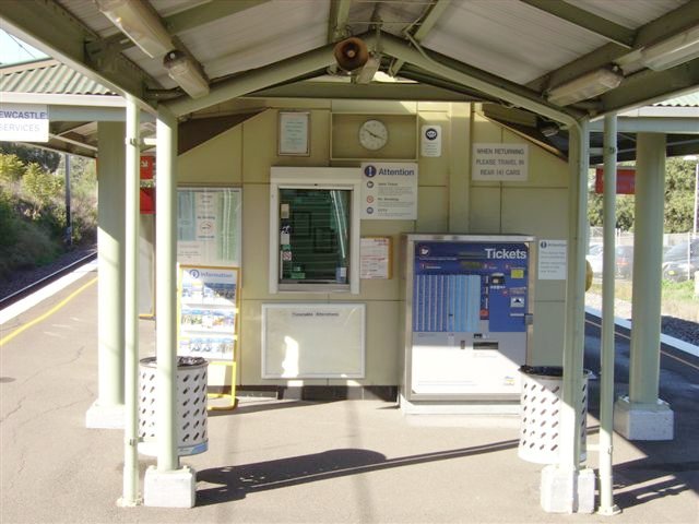 The manned ticket office as viewed from the base of the footbridge steps at Cardiff Station.