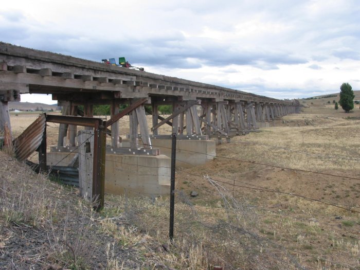 At 500m in length, this bridge across the Umaralla river and floodplain is the longest on the Bombala line. The photo is taken from the northern end, looking towards Chakola. Serious damage at the Chakola end was largely responsible for closing of the line.