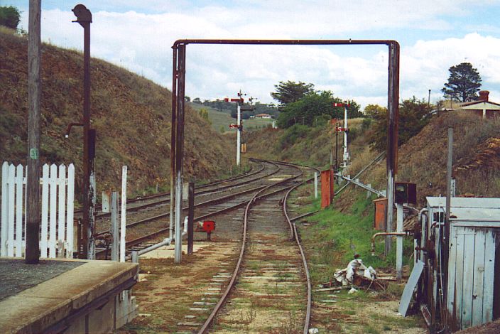 
The view south from the engine dock at Cooma station.  Note the 2 shunting
signals below the main semaphore signals.

