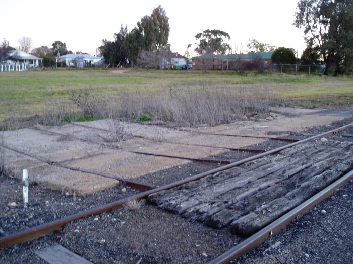 The concreate base of the former gangers shed. The rails for moving equipment onto the line are clearly visible.
