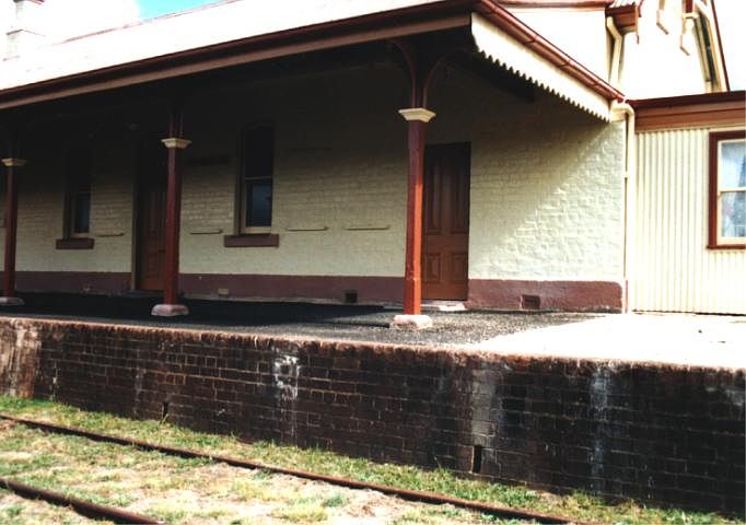 
The rail-side view and brick platform face.
