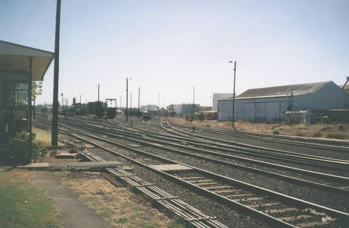 
The entrance to the yard, taken looking west from the Fitzroy Street
crossing.  Dubbo East Signal Box is on the far left, with the sanding tower
beyond the loco depot.
