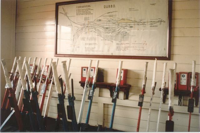 The interior of the signal box, with the lever frame and yard diagram.