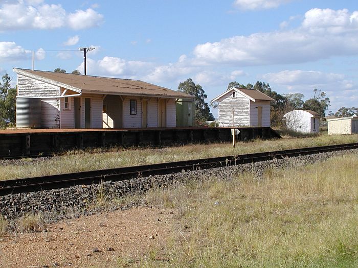 
The paint is flaking off the closed station building.  The platform has
been replaced with a full-height version.
