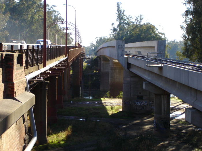 The road and rail bridges over the Murray.  Before the new rail bridge was built, cars and trains shared the road bridge on the left.