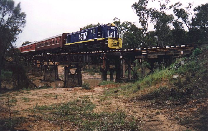 
48117 hauls an ARHS charter over a wooden bridge near the township
of Eumungerie.
