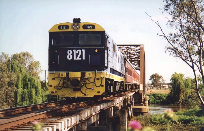 
8121 leads a chartered train over the Lachlan River bridge, just to the
south of Forbes.
