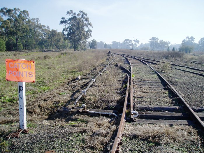 The view looking north along the triangle north leg towards the junction with the main line. The former station was located on the left in the middle distance.