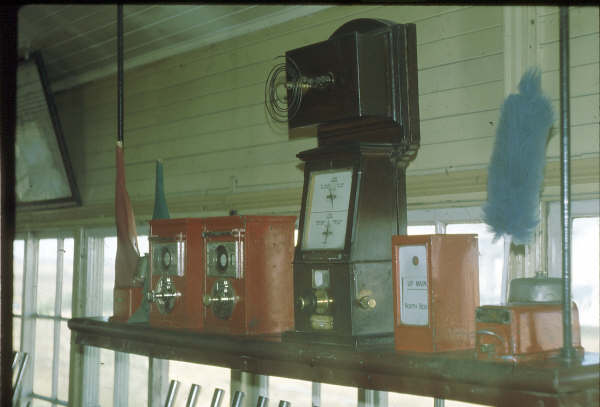 This is the array of of instruments on the shelf at Harden South Signal Box. There is the Tyers two wire block and also the standard NSWGR block instruments which never really did oust the ancient Tyers. Also the stiker bell and repeater can be seen.