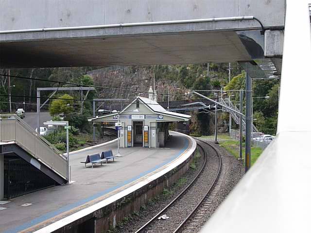 The view looking along the platform in the direction of Wollongong. The grassy area on the right contained a goods siding until recent years.
