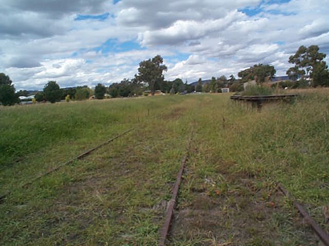 
One of the two goods loading banks.  The station is behind us, with the main
township beyond the trees in the distance.
