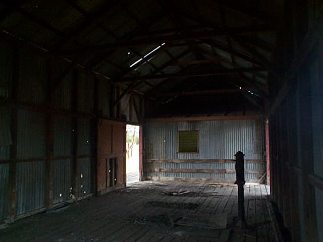 
The inside of the goods shed.  The post on the right is part of a set
of scales.

