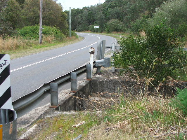 The remains of the old bridge and half-kilometre post near Jewells.