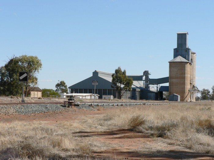 The view looking west towards the silo. The former station was located on the right hand side of the line in the distance.